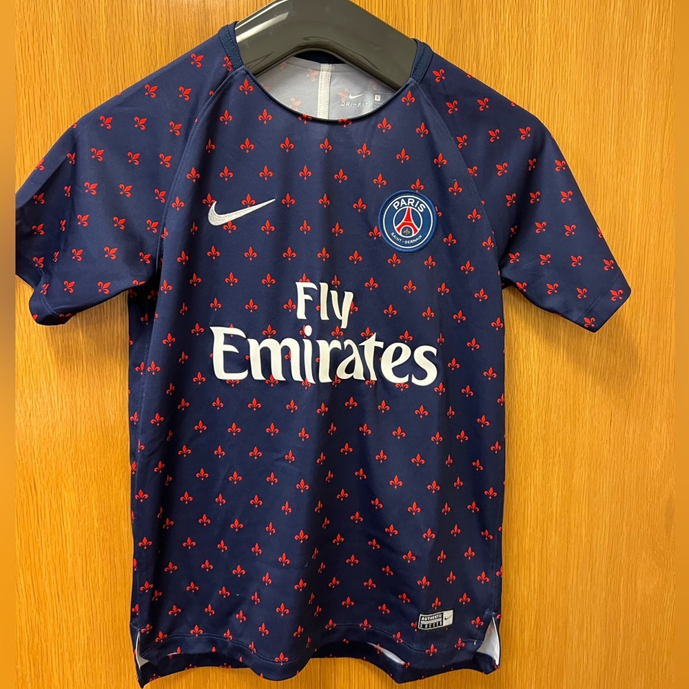 Paris Saint Germain (PSG) soccer jersey.